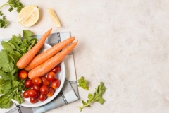 top-view-carrots-tomatoes-plate_23-2148381244
